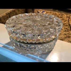 Glass cut large candy dish with gold rim.